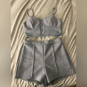 Women’s two piece, top and shorts. Soft velvety material. Size L